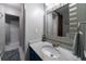 Bathroom with marble vanity and stylish mirror at 1209 Meadow Park Ln # B, Mount Pleasant, SC 29464