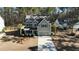 Two-story house with gray siding, driveway and landscaping, viewed from above at 123 Beam St, Huger, SC 29450
