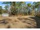 Large backyard with a shed and plenty of space for outdoor activities at 123 Beam St, Huger, SC 29450