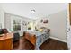 Charming bedroom with wood flooring and a cozy seating area at 123 Beam St, Huger, SC 29450