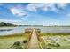 Enjoy fishing from this peaceful lakeside dock at 123 Beam St, Huger, SC 29450