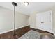 Spacious home gym with hardwood floors and mirrored walls at 123 Beam St, Huger, SC 29450