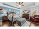 Spacious main bedroom with wood floors and seating area at 123 Beam St, Huger, SC 29450