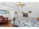 Main bedroom with hardwood floors and a comfortable seating area at 123 Beam St, Huger, SC 29450