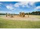 Community playground with swings, slides, and picnic tables at 123 Beam St, Huger, SC 29450