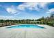 Community swimming pool with a pergola and seating area at 123 Beam St, Huger, SC 29450
