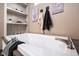 Relaxing bathroom with soaking tub and built-in shelving at 1225 Old Black Oak Rd, Moncks Corner, SC 29461