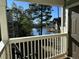 Private balcony overlooking tranquil lake and lush greenery at 1481 Center Street Ext # 1808, Mount Pleasant, SC 29464