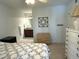 Bedroom with a queen-size bed, dresser, and ensuite bathroom at 1481 Center Street Ext # 1808, Mount Pleasant, SC 29464