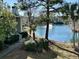Attractive exterior view of condo building near a peaceful lake at 1481 Center Street Ext # 1808, Mount Pleasant, SC 29464
