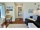 Living room with view into bedroom and access to the balcony at 1481 Center Street Ext # 1808, Mount Pleasant, SC 29464