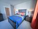 Bedroom with blue bedding, and gray dresser at 1573 Trailmore Ln, Summerville, SC 29486