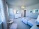 Spacious bedroom with white dresser and a light blue bed frame at 1573 Trailmore Ln, Summerville, SC 29486