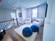 Upstairs loft with hardwood floors and plenty of natural light at 1573 Trailmore Ln, Summerville, SC 29486