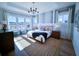 Main bedroom with a king-size bed and a stylish dresser at 1573 Trailmore Ln, Summerville, SC 29486