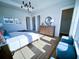 Bright main bedroom with walk-in closet and hardwood floors at 1573 Trailmore Ln, Summerville, SC 29486