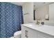 Clean bathroom with white vanity, blue shower curtain, and new fixtures at 1723 Live Oak Park # 1723, Seabrook Island, SC 29455