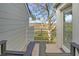 Relaxing deck overlooking marsh views with wooden chairs at 1723 Live Oak Park # 1723, Seabrook Island, SC 29455