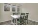 Small dining area with white table and green chairs at 1723 Live Oak Park # 1723, Seabrook Island, SC 29455