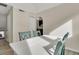 Small dining area with white table and green chairs at 1723 Live Oak Park # 1723, Seabrook Island, SC 29455