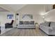 Living area with hardwood floors, sofas, and access to sunroom at 1723 Live Oak Park # 1723, Seabrook Island, SC 29455