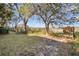Landscaped yard with wooden footbridge leading to marsh at 1723 Live Oak Park # 1723, Seabrook Island, SC 29455