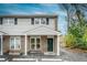 Inviting exterior of a townhome with brick accents and a covered entryway at 1735 Boone Hall Dr # K14, Charleston, SC 29407