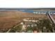 Aerial view showing home's location near water at 1860 Headquarters Plantation Dr, Johns Island, SC 29455