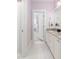 Bathroom with double vanity, granite countertop, and access to bedroom at 1860 Headquarters Plantation Dr, Johns Island, SC 29455