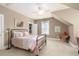 Charming bedroom with metal bed frame and soft color scheme at 1860 Headquarters Plantation Dr, Johns Island, SC 29455