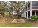 Elevated wooden deck with bench, nestled amongst the trees at 1860 Headquarters Plantation Dr, Johns Island, SC 29455