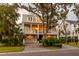 Two story home with a large porch and two car garage at 1860 Headquarters Plantation Dr, Johns Island, SC 29455