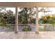 Front porch with view of trees and neighborhood at 1860 Headquarters Plantation Dr, Johns Island, SC 29455
