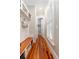 Mudroom features built-in bench, shelves, and hardwood floors at 1860 Headquarters Plantation Dr, Johns Island, SC 29455