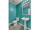 Teal bathroom with pedestal sink and tiled floor at 230 Eagle Ridge Rd, Summerville, SC 29485