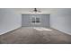 Spacious bedroom with grey carpet and ceiling fan at 230 Eagle Ridge Rd, Summerville, SC 29485