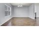 Bright dining room features hardwood floors, a chandelier, and a fireplace at 230 Eagle Ridge Rd, Summerville, SC 29485