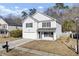 Two-story house with white siding, black shutters, and a two-car garage at 230 Eagle Ridge Rd, Summerville, SC 29485