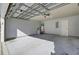 Attached garage with open door, water heater, and electrical panel at 230 Eagle Ridge Rd, Summerville, SC 29485