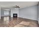 Living room with hardwood floors and a corner fireplace at 230 Eagle Ridge Rd, Summerville, SC 29485