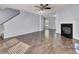 Open concept living room with hardwood floors and a fireplace at 230 Eagle Ridge Rd, Summerville, SC 29485