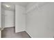 Spacious walk-in closet with double hanging rods and neutral carpeting at 230 Eagle Ridge Rd, Summerville, SC 29485