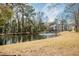 Community pond with fountain and lush landscaping at 2323 Tall Sail Dr # F, Charleston, SC 29414
