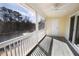 Bright screened porch with water views and ceiling fan at 2323 Tall Sail Dr # F, Charleston, SC 29414