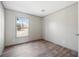 Spacious bedroom with wood-look floors and a window at 240 Carolina Dr, Saint Stephen, SC 29479