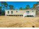 New home with deck and surrounding undeveloped land at 240 Carolina Dr, Saint Stephen, SC 29479
