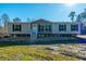 New single-story home with neutral siding and white trim at 240 Carolina Dr, Saint Stephen, SC 29479