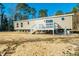 New home with deck and surrounding undeveloped land at 240 Carolina Dr, Saint Stephen, SC 29479