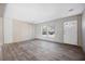Spacious living room with wood-look flooring at 240 Carolina Dr, Saint Stephen, SC 29479