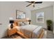 Light and airy bedroom with wood platform bed and ceiling fan at 2655 Madden Dr, North Charleston, SC 29405